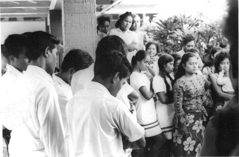 I-Kiribati students gather in reverence for their baptism