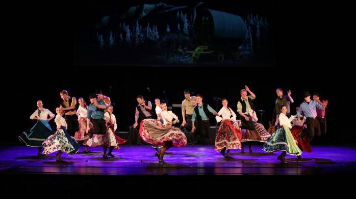 The folk dancers perform a gypsy suite during the performance in O