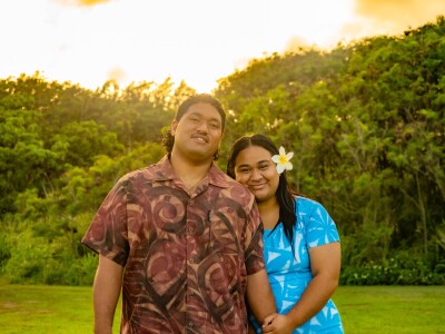Malone and Logan Fepulea'i pause together in their traditional attire.