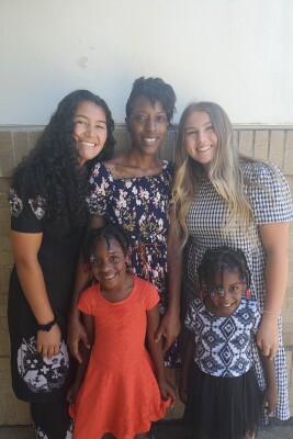Sister Angilau during her mission with some members and her companion