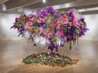 Many bouquets of flowers together to form a flower cloud.