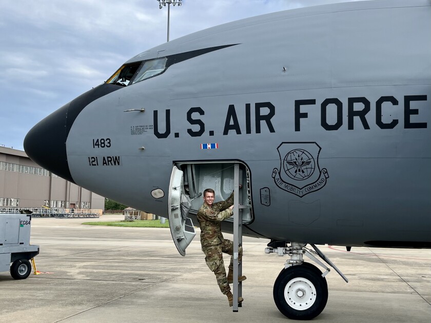 Parker boards a plane labeled "U.S. Air Force." He wears green camo.
