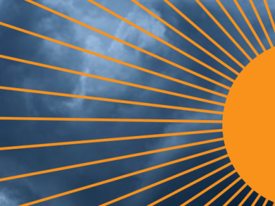 Cloudy background with orange-colored sun