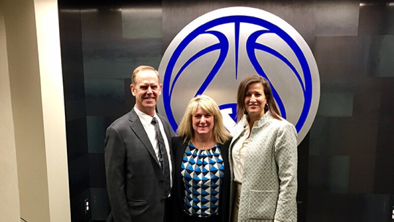 NCAA Director Amy Wilson with BYU Athletic Director Tom Holmoe and Associate Athletic Director Liz Darger