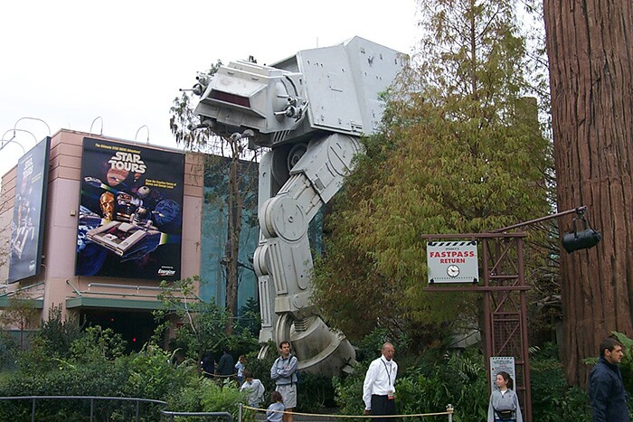 a giant machine from the Star Wars movies sites in an amusement park