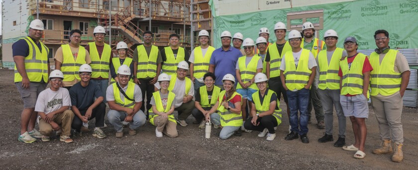 CFM students at a construction site.