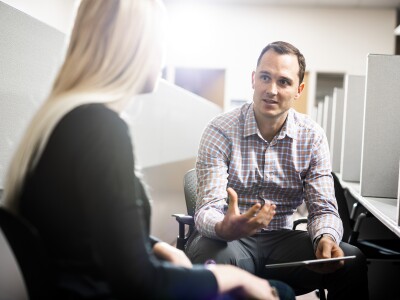 Man explains an answer to question