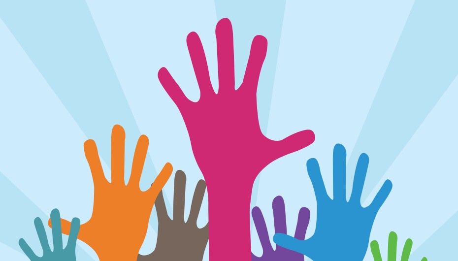 Various colored hands reaching in the air