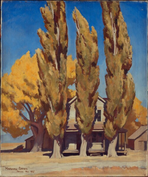 Yellow and green trees almost obscure a small wooden house, but snatches of it peer out.