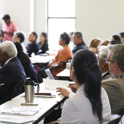 Delegates listening to panelists