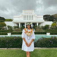 A photo of Kesaia Bourne in front of the Laie temple.