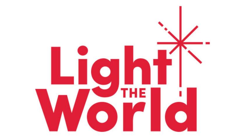 Red text that reads "Light the world" with a red star above it
