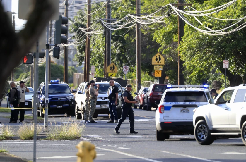 Few men and cops with their cars on the road.