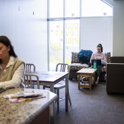 Students in living room of Heritage Halls