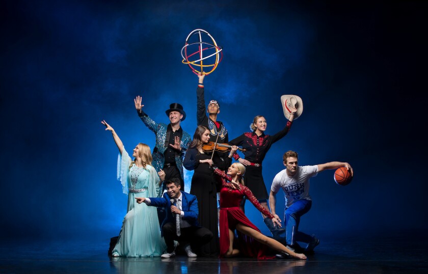 China Spectacular cast poses in front of a blue background