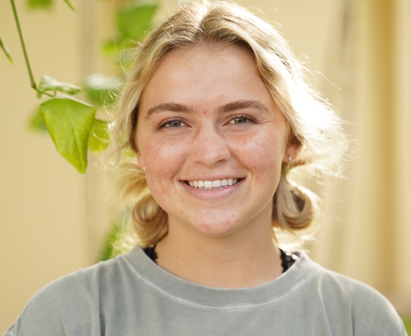 close-up shot of blonde girl smiling for the camera