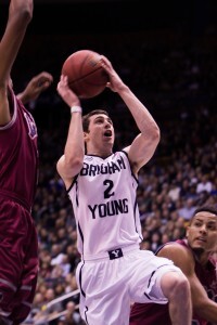 Matt Carlino drives through the LMU defense to score a basket during Saturday