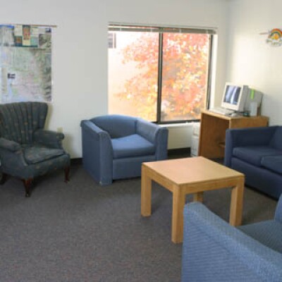 Living room at the Language Immersion student residence with 3 couches