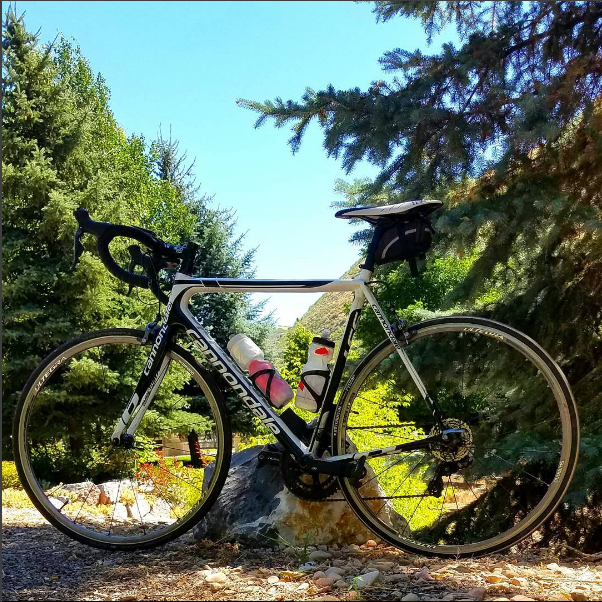 Brad Dayton poses his mountain bike along the Hobble Creek trail. Utah is home to hundreds of mountain biking trails. (Brad Dayton Instagram)