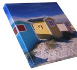 an image of a picture of a small house on sand