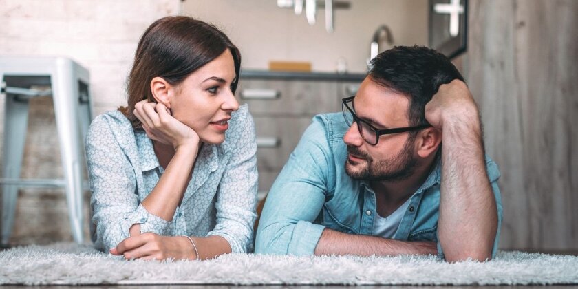 Woman and man talking together