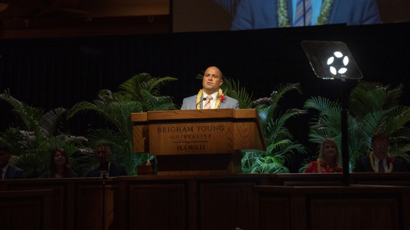 President Kauwe speaking to the students at the devotional.