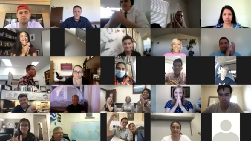 Screenshot of participants, judges, mentors and viewers clapping during a Zoom event.