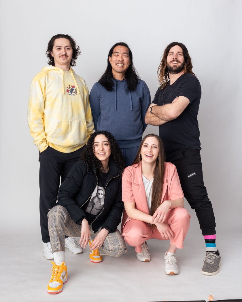 The Convoi Ventures Dream Team! - Back row: Reuben Holdaway (analyst), Trent Mano (co-founder), Scott Paul (co-founder) Front row: Sarah Mikesell (executive assistant), Nicole Utley (events manager)