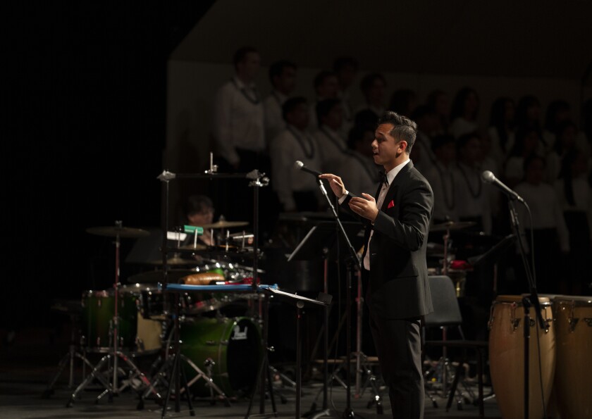 A man conducted music on a music concert.