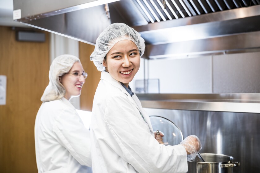 NDSF sensory lab students in white and hair nets.jpg