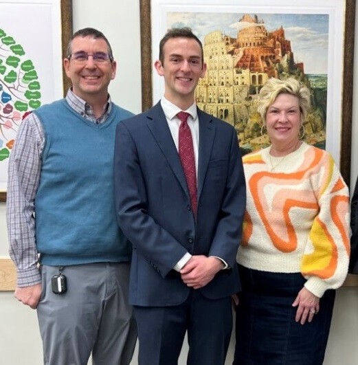2022 Thesis Defense. Student Colin Lilya pictured together with professors Troy Cox and Teresa Bell. From left to right: Cox, Lilya, Bell.