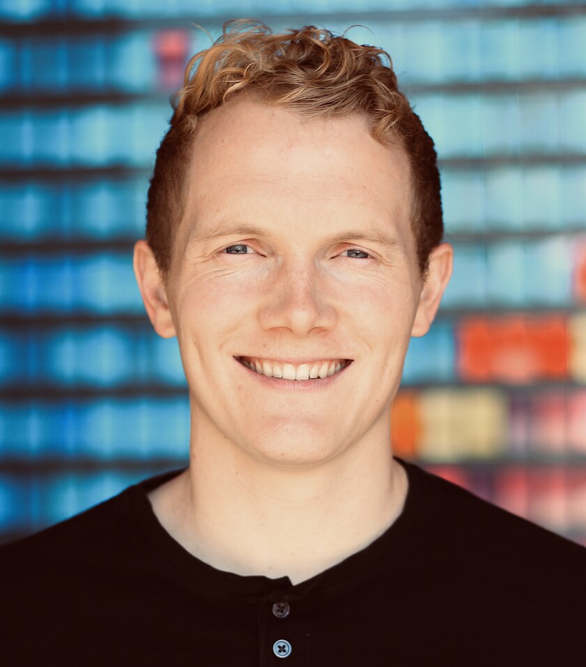 Professional headshot of John Koelliker