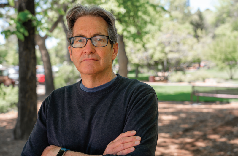 Steven Peck standing in a park