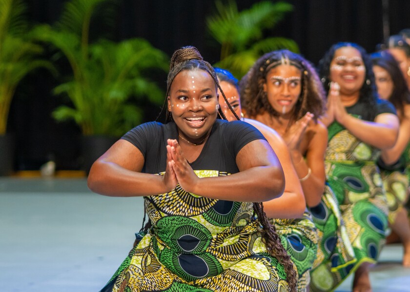 A woman dances for BYUH Afro World Club during Culture Night 2025.