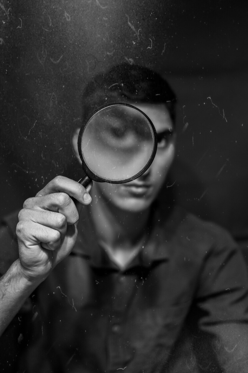 Man with magnifying glass