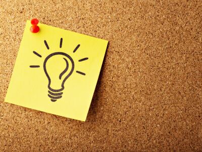 Image of a post it note with a light bulb drawn on