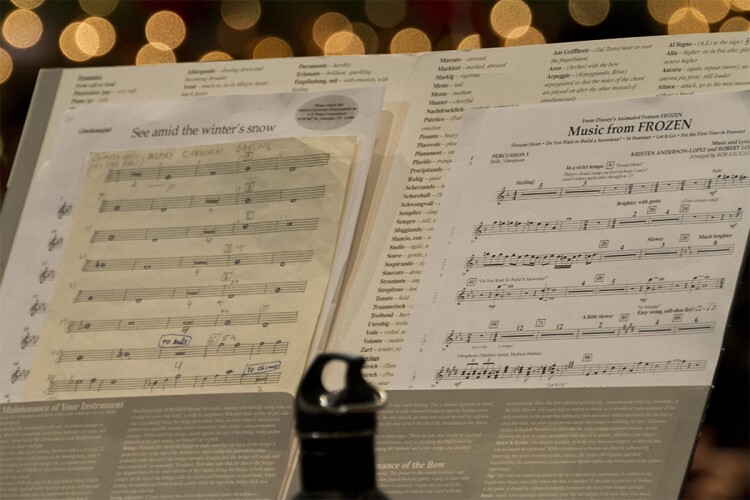A folder full of sheet music