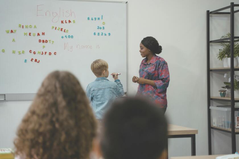Woman teaching an English class.