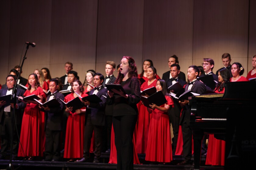 Dr. Glenn singing with the choir.