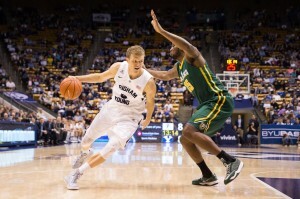Haws drives by a San Francisco defender in 2014. The Cougars are forced to replace Haws this year. (Universe Archive)