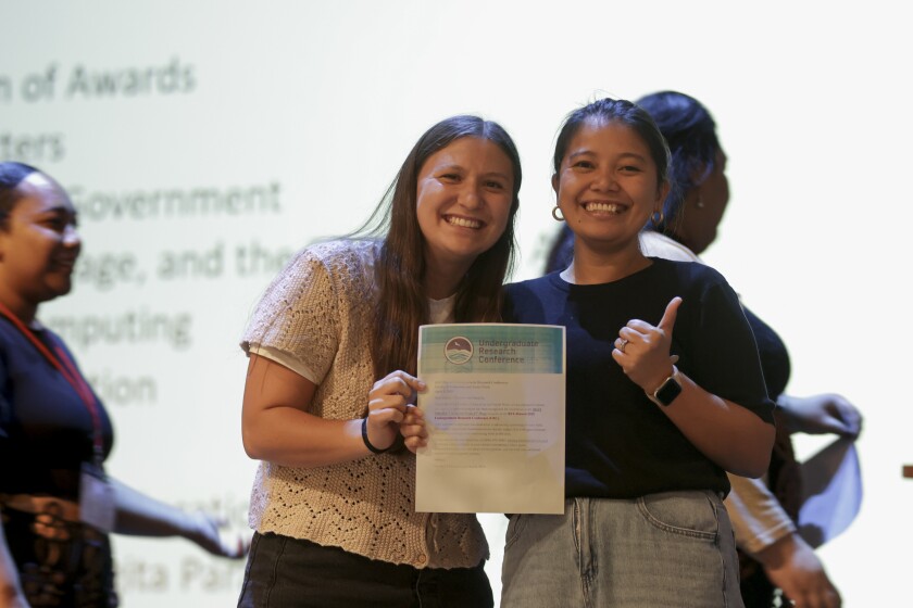 A photo of Cheszana Costales and Danielle Rummler