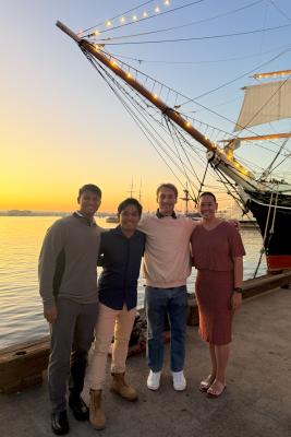 BYUH Research Team by a boat and water