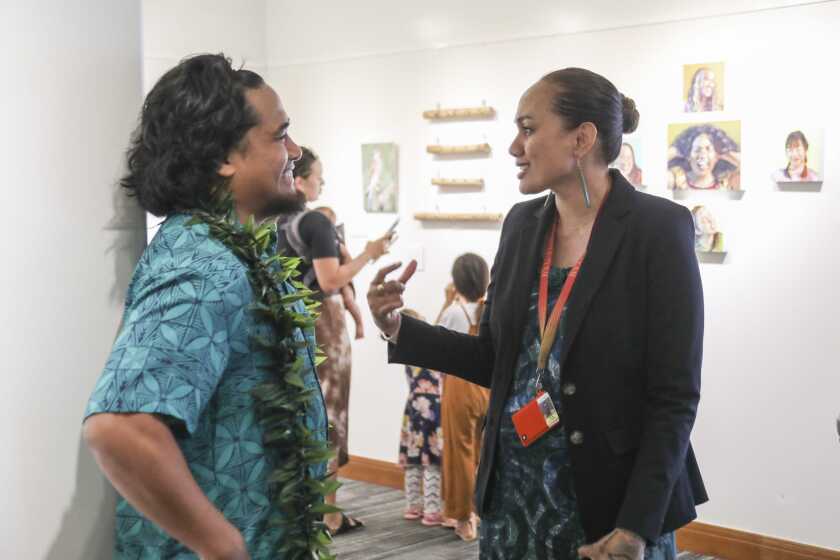 Photo of artist Julius Tafiti and curator Line Kruse