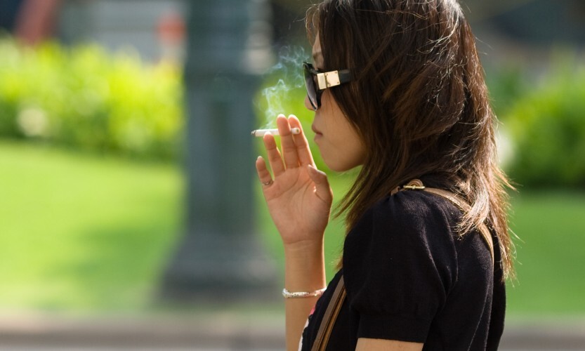 A woman smoking a cigarette