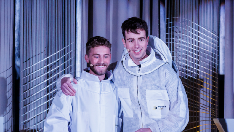 Tyler Lenning and team pose with $12,000 check.