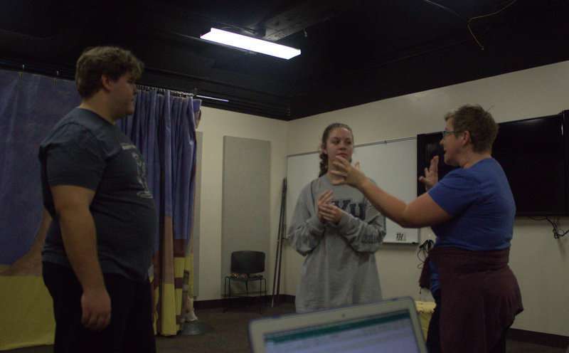 Toby and Maria being directed by Professor Jones