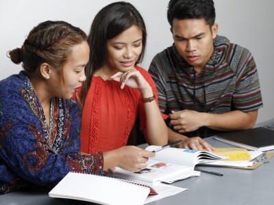 Image of multicultural students studying together