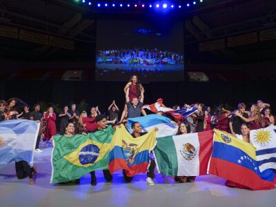 A photo of cultural group of people dancing a BYU-Hawaii