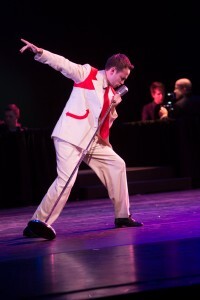 Tanner DeWall sings a solo impersonating Elvis Presley during Young Ambassadors performance of