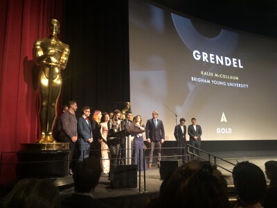 Kalee McCollaum and students accept the award for Grendel